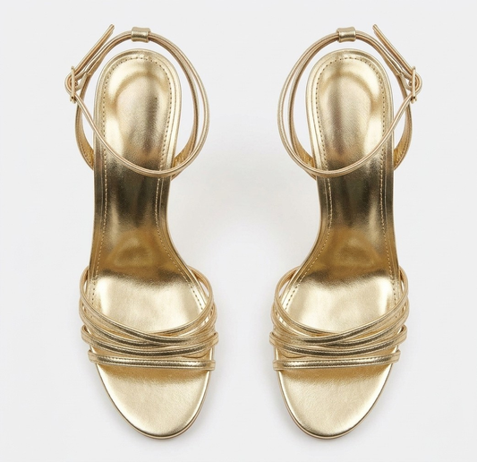 Sandales dorées à brides et talons hauts