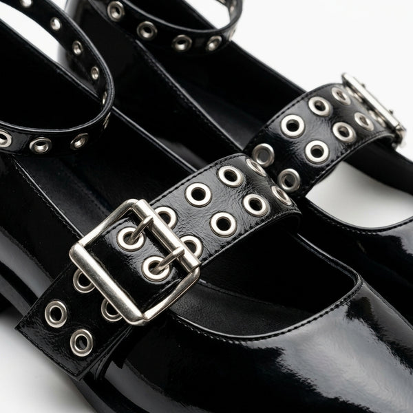 Black pointed toe shoe with eyelet straps