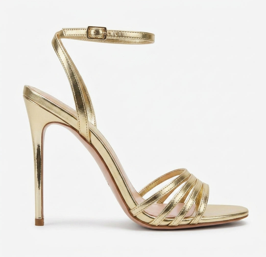 Sandales dorées à brides et talons hauts